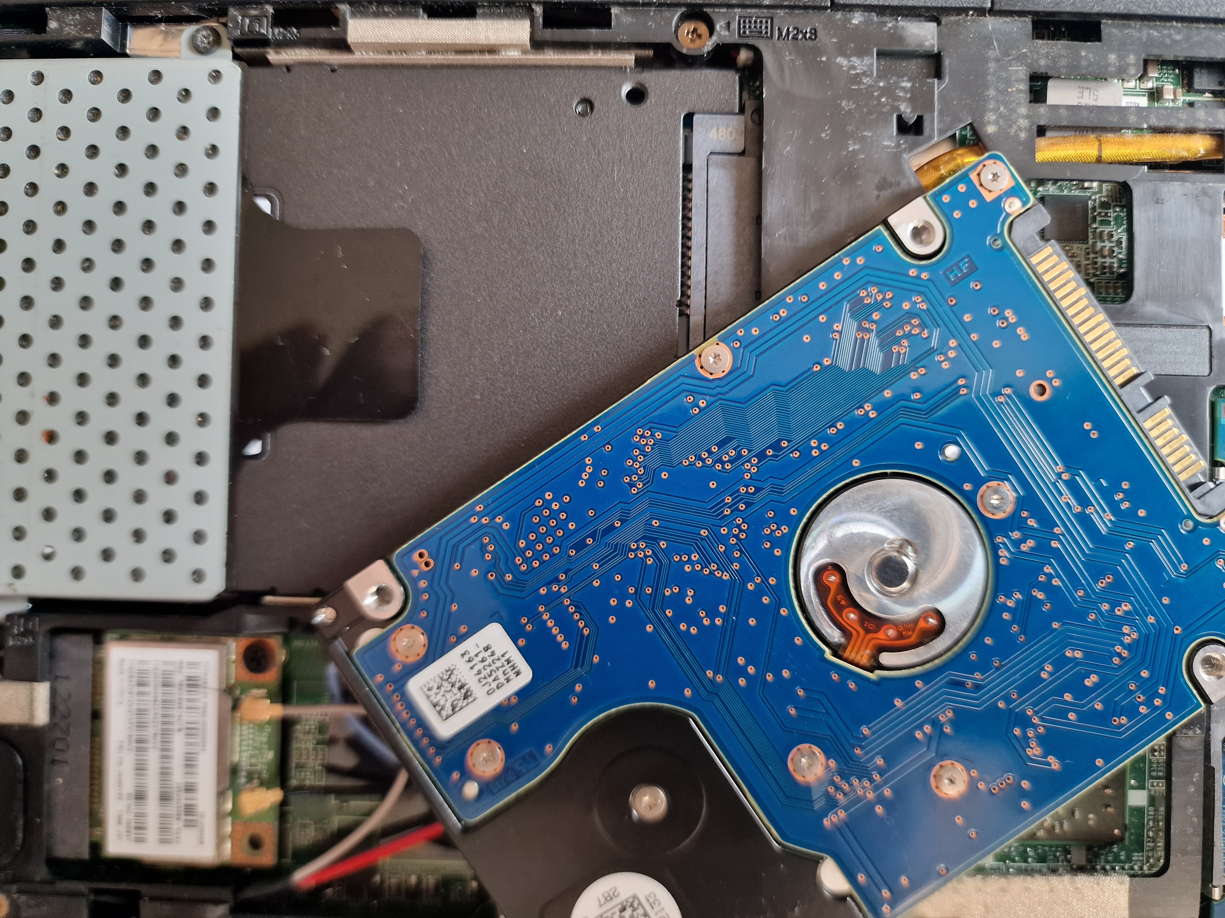 Swapping out the old hard drive for a new SSD